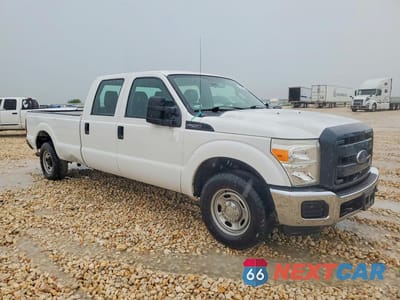 Czwarte zdjęcie samochodu z boku: 2014 FORD F250 SUPER DUTY VIN:1FT7W2A60EEB06311 - miniatura