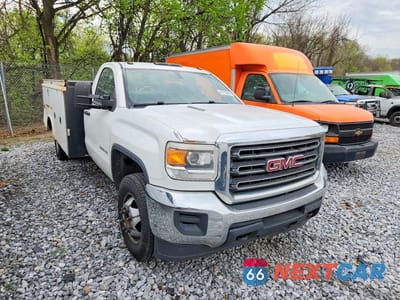 Czwarte zdjęcie samochodu z boku: 2015 GMC SIERRA C3500 HEAVY DUTY VIN:1GD311C89FF149896 - miniatura