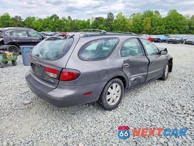 Trzecie zdjęcie samochodu z tyłu: 2003 FORD TAURUS SEL VIN:1FAFP59S83A234799 - miniatura