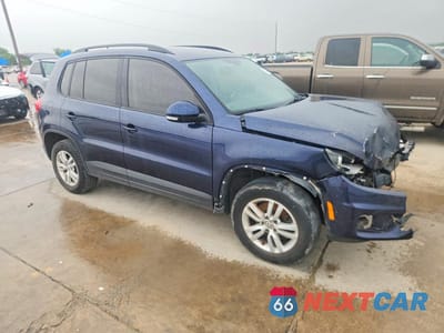 Czwarte zdjęcie samochodu z boku: 2016 VOLKSWAGEN TIGUAN S VIN:WVGAV7AX1GW612981 - miniatura
