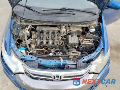 Zdjęcie 11 z 12 samochodu: 2013 HONDA INSIGHT LX VIN:JHMZE2H51DS006676 - miniatura