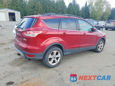Trzecie zdjęcie samochodu z tyłu: 2014 FORD ESCAPE SE VIN:1FMCU0GX6EUD34646 - miniatura