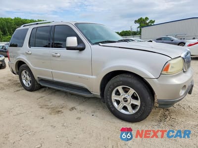 Czwarte zdjęcie samochodu z boku: 2004 LINCOLN AVIATOR VIN:5LMEU88H04ZJ38814 - miniatura