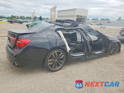 Trzecie zdjęcie samochodu z tyłu: 2019 BMW M760 XI VIN:WBA7H6C5XKG615048 - miniatura