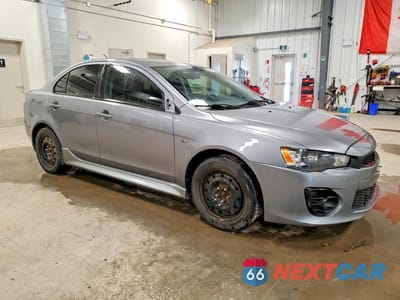 Czwarte zdjęcie samochodu z boku: 2017 MITSUBISHI LANCER ES VIN:JA32V2FW5HU601795 - miniatura