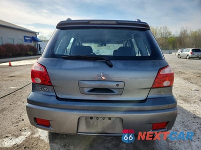Zdjęcie 6 z 12 samochodu: 2005 MITSUBISHI OUTLANDER LS VIN:JA4LZ31F25U049170 - miniatura