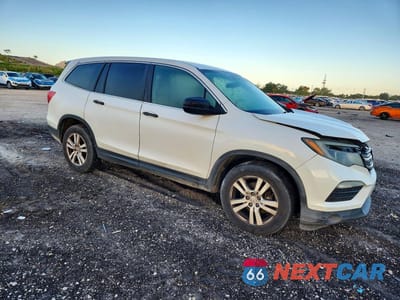 Czwarte zdjęcie samochodu z boku: 2017 HONDA PILOT LX VIN:5FNYF5H13HB009106 - miniatura