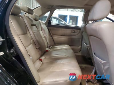 Zdjęcie 10 z 12 samochodu: 2001 TOYOTA AVALON XLS VIN:4T1BF28B21U188082 - miniatura