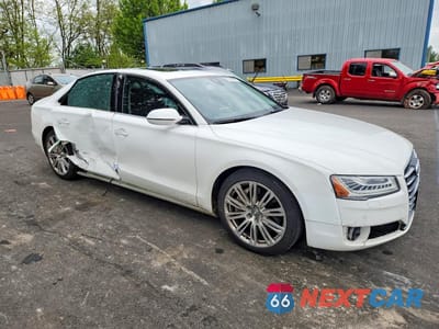 Czwarte zdjęcie samochodu z boku: 2015 AUDI A8 QUATTRO VIN:WAUJGAFD8FN019937 - miniatura