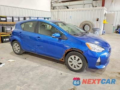 Czwarte zdjęcie samochodu z boku: 2014 TOYOTA PRIUS C TWO VIN:JTDKDTB34E1564340 - miniatura