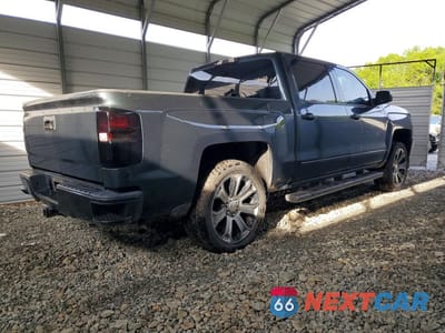 Trzecie zdjęcie samochodu z tyłu: 2017 CHEVROLET SILVERADO K1500 LT VIN:3GCUKREC1HG451304 - miniatura