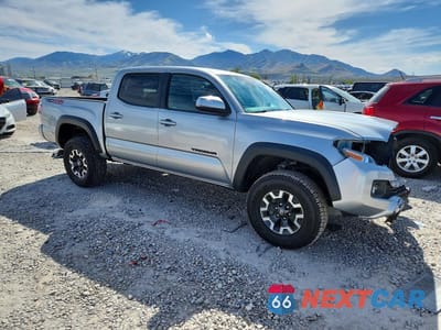 Czwarte zdjęcie samochodu z boku: 2022 TOYOTA TACOMA TRD OFF-ROAD VIN:3TMCZ5AN3NM491954 - miniatura