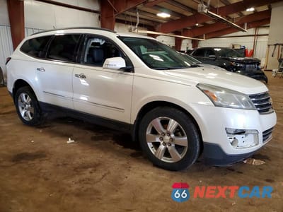 Czwarte zdjęcie samochodu z boku: 2014 CHEVROLET TRAVERSE LTZ VIN:1GNKRJKD0EJ316463 - miniatura