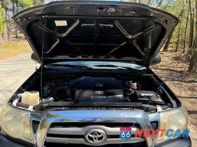 Zdjęcie 8 z 11 samochodu: 2009 TOYOTA TACOMA DOUBLE CAB VIN:3TMLU42N59M033121 - miniatura