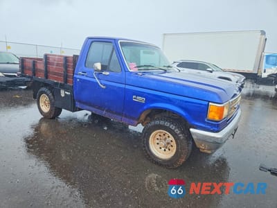 Czwarte zdjęcie samochodu z boku: 1987 FORD F150 FLATBED TRUCK VIN:1FTEF14H4HKA46876 - miniatura