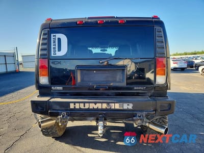 Zdjęcie 6 z 13 samochodu: 2003 HUMMER H2 VIN:5GRGN23U13H107489 - miniatura