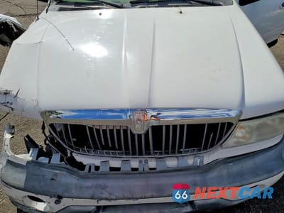 Zdjęcie 11 z 12 samochodu: 1999 LINCOLN NAVIGATOR VIN:5LMPU28A5XLJ34855 - miniatura
