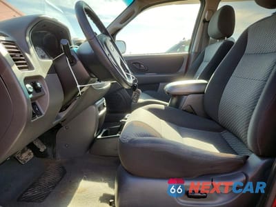 Zdjęcie 7 z 12 samochodu: 2003 FORD ESCAPE XLT VIN:1FMYU93133KA22143 - miniatura