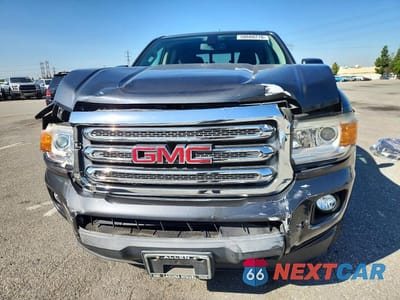 Piąte zdjęcie samochodu w środku: 2016 GMC CANYON SLE VIN:1GTG5CE36G1390322 - miniatura