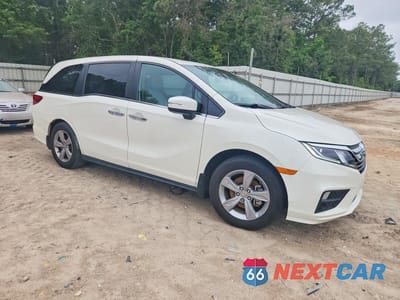 Czwarte zdjęcie samochodu z boku: 2018 HONDA ODYSSEY EXL VIN:5FNRL6H7XJB085015 - miniatura