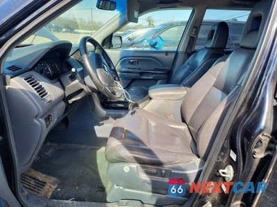 Zdjęcie 7 z 11 samochodu: 2004 HONDA PILOT EXL VIN:2HKYF187X4H605001 - miniatura