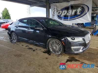 Czwarte zdjęcie samochodu z boku: 2019 LINCOLN MKZ VIN:3LN6L5KU3KR625103 - miniatura