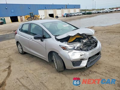 Czwarte zdjęcie samochodu z boku: 2016 HONDA FIT LX VIN:3HGGK5H54GM702501 - miniatura