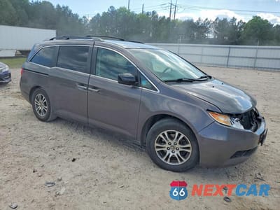 Czwarte zdjęcie samochodu z boku: 2012 HONDA ODYSSEY VIN:5FNRL5H63CB034752 - miniatura
