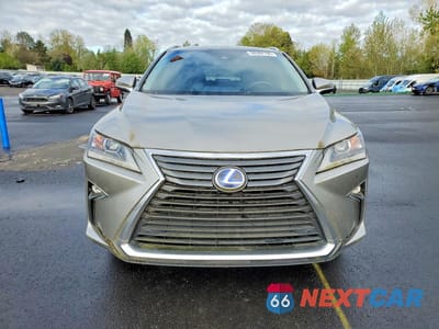 Piąte zdjęcie samochodu w środku: 2017 LEXUS RX 450H BASE VIN:2T2BGMCA1HC010243 - miniatura