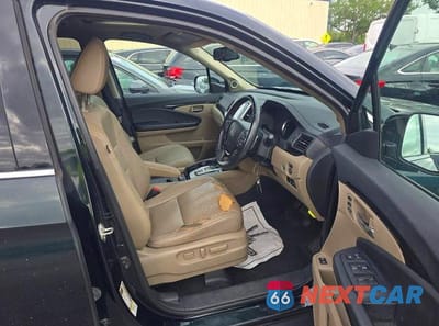 Piąte zdjęcie samochodu w środku: 2016 HONDA PILOT TOURING VIN:5FNYF5H96GB009783 - miniatura