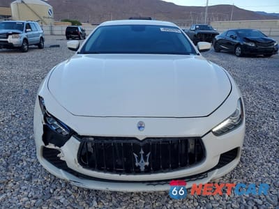 Piąte zdjęcie samochodu w środku: 2017 MASERATI GHIBLI VIN:ZAM57XSA3H1197523 - miniatura