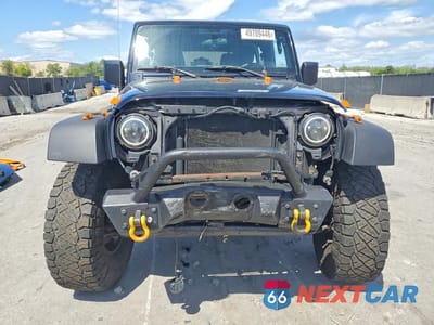 Piąte zdjęcie samochodu w środku: 2016 JEEP WRANGLER UNLIMITED SPORT VIN:1C4BJWDG4GL255694 - miniatura