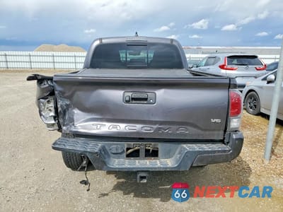 Zdjęcie 6 z 12 samochodu: 2021 TOYOTA TACOMA TRD OFF-ROAD VIN:5TFCZ5AN2MX258348 - miniatura