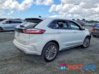 Trzecie zdjęcie samochodu z tyłu: 2022 FORD EDGE TITANIUM VIN:2FMPK4K91NBB01884 - miniatura