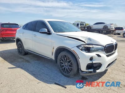 Czwarte zdjęcie samochodu z boku: 2015 BMW X6 XDRIVE50I VIN:5UXKU6C5XF0F94310 - miniatura