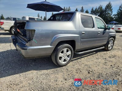 Trzecie zdjęcie samochodu z tyłu: 2009 HONDA RIDGELINE RTL VIN:5FPYK16519B100877 - miniatura