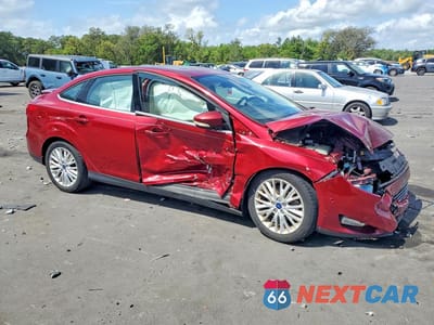 Czwarte zdjęcie samochodu z boku: 2017 FORD FOCUS TITANIUM VIN:1FADP3J29HL322974 - miniatura