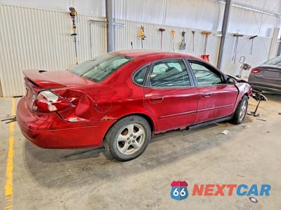 Trzecie zdjęcie samochodu z tyłu: 2003 FORD TAURUS SE VIN:1FAFP53203G183160 - miniatura
