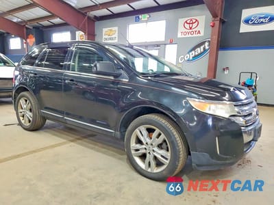 Czwarte zdjęcie samochodu z boku: 2011 FORD EDGE LIMITED VIN:2FMDK4KC0BBA32535 - miniatura
