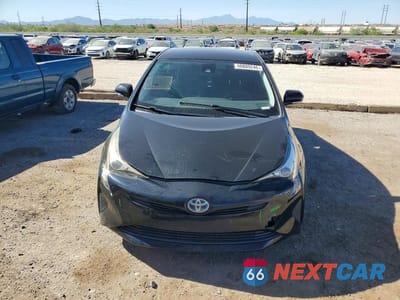 Piąte zdjęcie samochodu w środku: 2017 TOYOTA PRIUS TWO VIN:JTDKBRFUXH3546705 - miniatura