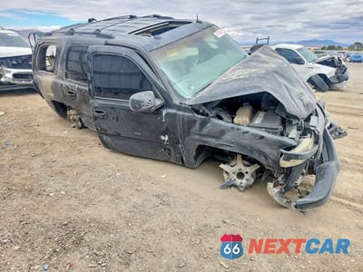 Czwarte zdjęcie samochodu z boku: 2003 GMC YUKON VIN:1GKEC13TX3R244638 - miniatura