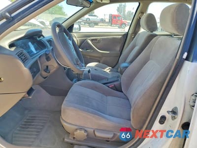 Zdjęcie 7 z 13 samochodu: 1997 TOYOTA CAMRY LE VIN:JT2BG22K1V0049416 - miniatura