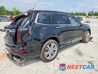 Trzecie zdjęcie samochodu z tyłu: 2024 CADILLAC XT6 PLATINUM PREMIUM LUXURY VIN:1GYKPERS4RZ715520 - miniatura