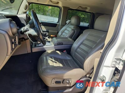 Zdjęcie 7 z 12 samochodu: 2003 HUMMER H2 VIN:5GRGN23U43H130412 - miniatura