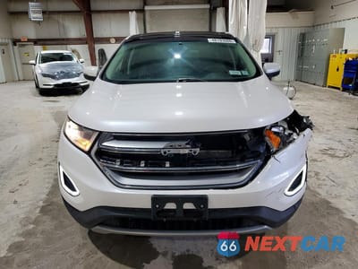 Piąte zdjęcie samochodu w środku: 2018 FORD EDGE TITANIUM VIN:2FMPK4K83JBC57183 - miniatura