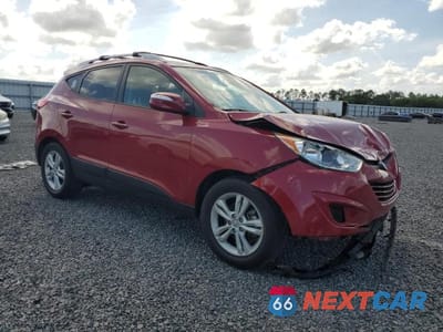 Czwarte zdjęcie samochodu z boku: 2012 HYUNDAI TUCSON GLS VIN:KM8JU3AC3CU355157 - miniatura