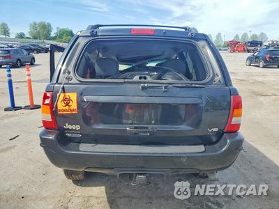 Zdjęcie 6 z 13 samochodu: 2003 JEEP GRAND CHEROKEE OVERLAND VIN:1J8GW68J33C611908 - miniatura