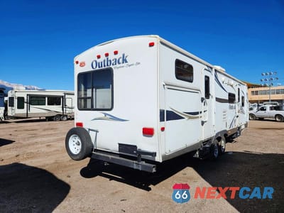 Czwarte zdjęcie samochodu z boku: 2012 KEYSTONE OUTBACK CAMPER VIN:4YDT31224CB453357 - miniatura