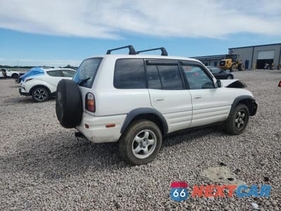 Trzecie zdjęcie samochodu z tyłu: 1999 TOYOTA RAV4 BASE VIN:JT3HP10V7X7117595 - miniatura