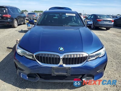 Piąte zdjęcie samochodu w środku: 2021 BMW 330I VIN:3MW5R1J07M8C09597 - miniatura